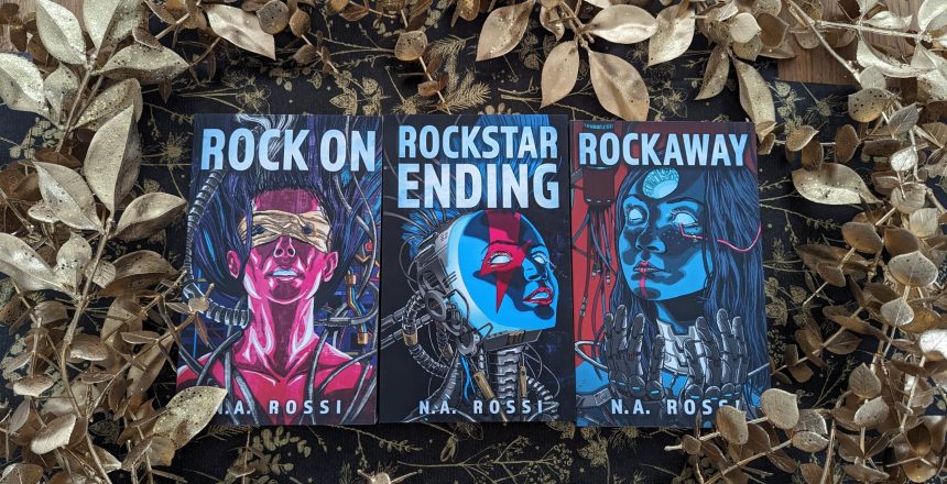 The three books in the Rockstar Ending series surounded by gold glittery leaves